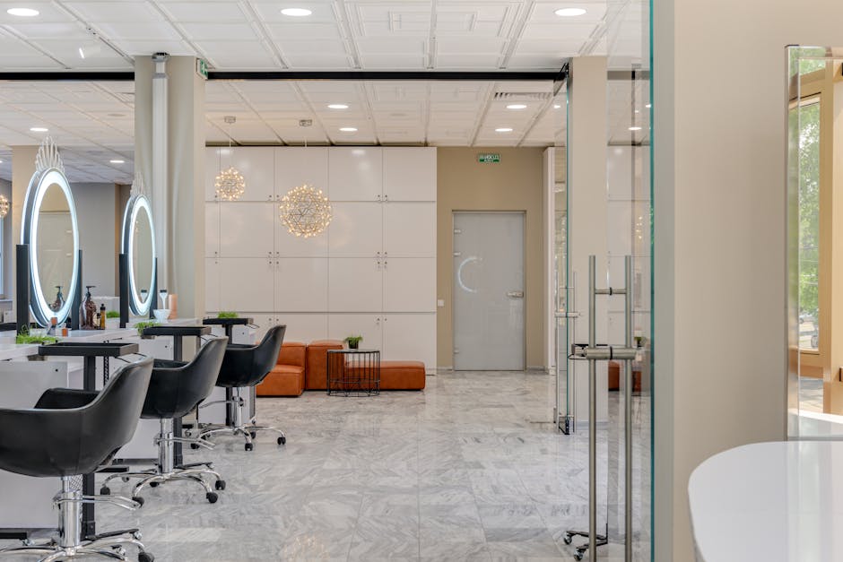 Bright and stylish beauty salon interior showcasing modern design and elegant furnishings.